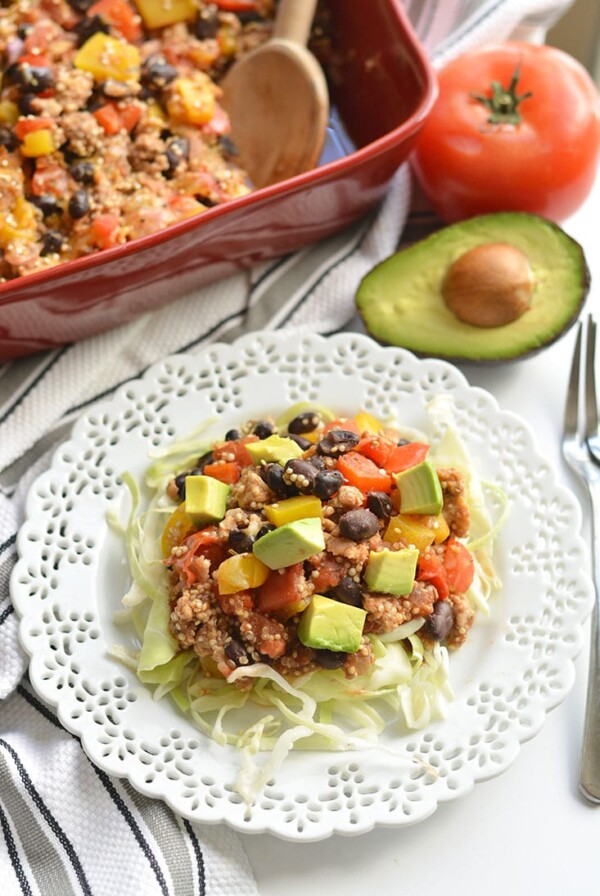 Easy & healthy Mexican Quinoa Casserole! Made with black beans, chicken & array of vegetables, this is tasty dish is one the entire family will love! Gluten Free + Low Calorie!