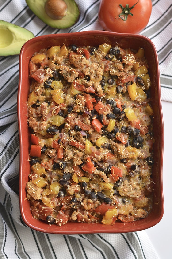 Easy & healthy Mexican Quinoa Casserole! Made with black beans, chicken & array of vegetables, this is tasty dish is one the entire family will love! Gluten Free + Low Calorie!