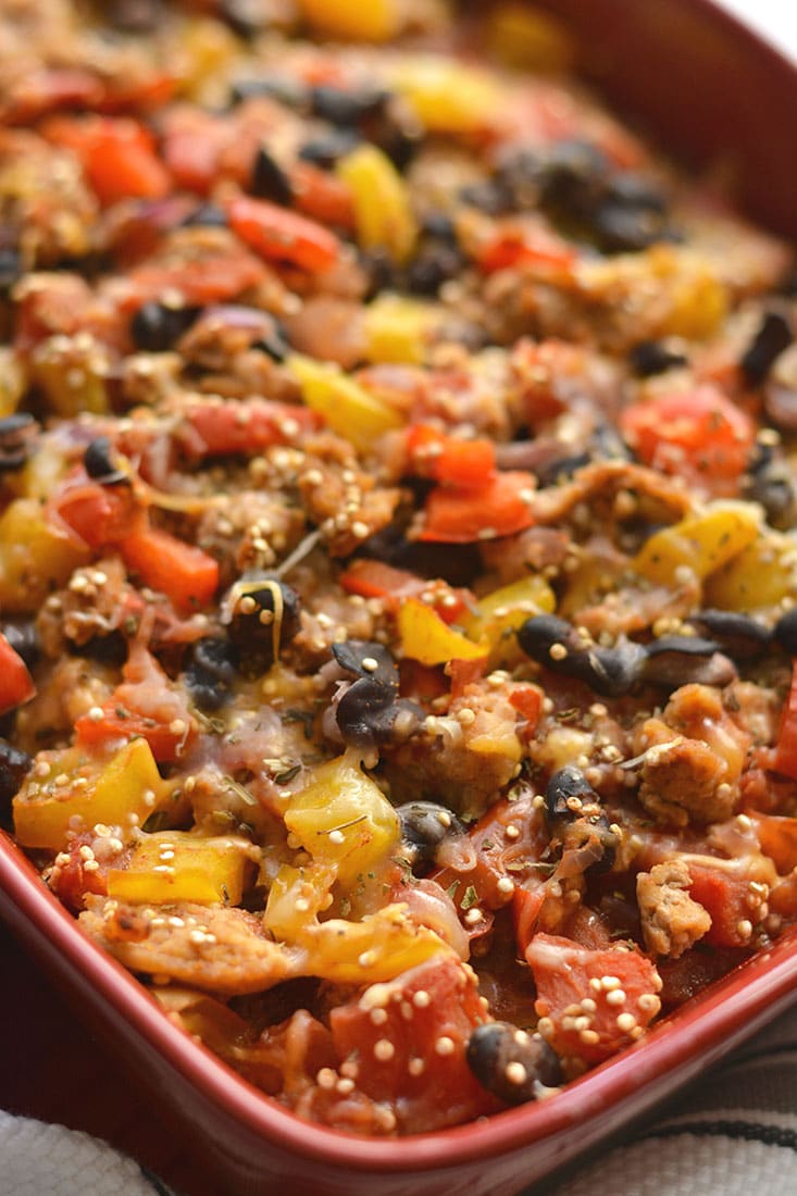 Easy & healthy Mexican Quinoa Casserole! Made with black beans, chicken & array of vegetables, this is tasty dish is one the entire family will love! Gluten Free + Low Calorie!