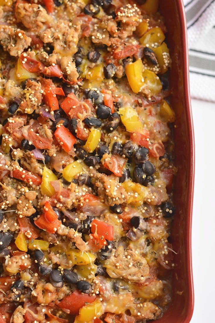 Easy & healthy Mexican Quinoa Casserole! Made with black beans, chicken & array of vegetables, this is tasty dish is one the entire family will love! Gluten Free + Low Calorie!