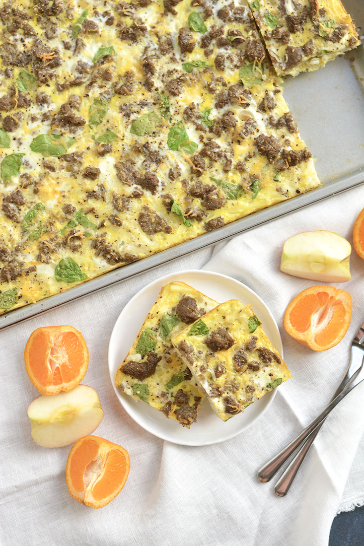 Sheet Pan Breakfast Pizza! Your favorite breakfast pizza turned healthy. Layered with healthy ingredients, this breakfast pizza has big flavor for less calories. Baked on a sheet pan for easy cleanup! Gluten Free + Low Calorie