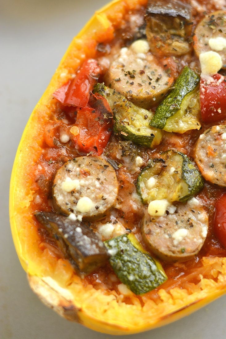 Spaghetti Squash Pizza! Customize with your favorite pizza toppings for an easy to make meal that's low carb, filling & delicious! Gluten Free + Low Calorie