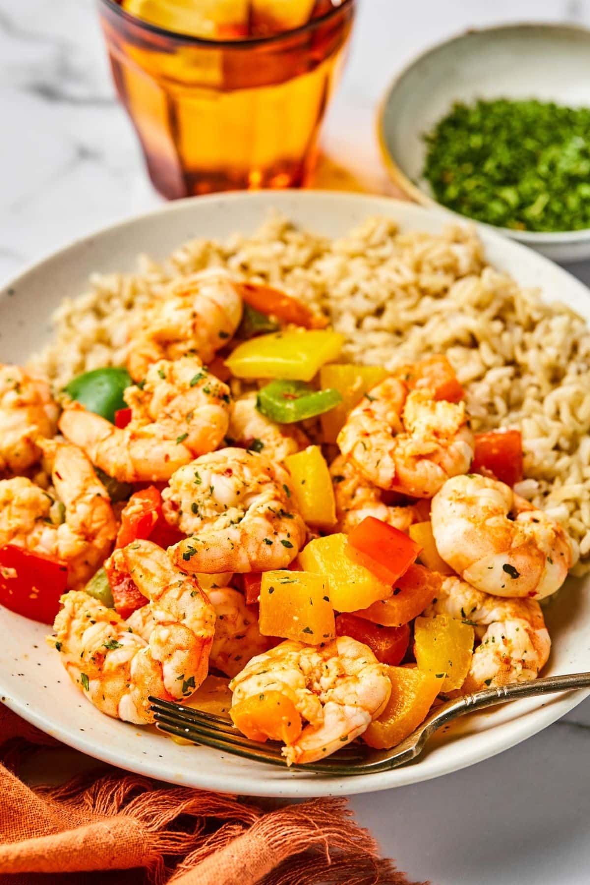 Shrimp and rice skillet served on a plate.