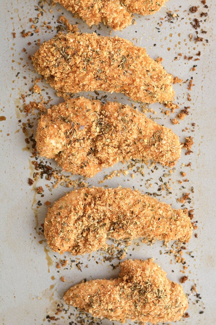 These Healthy Chicken Fingers have the same crunch of fried chicken for a fraction of the calories! Made with 4 ingredients, this Gluten Free meal is one you can feel good about eating! Gluten Free + Low Calorie