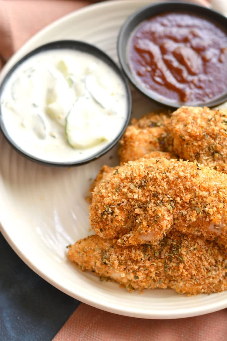 These Healthy Chicken Fingers have the same crunch of fried chicken for a fraction of the calories! Made with 4 ingredients, this Gluten Free meal is one you can feel good about eating! Gluten Free + Low Calorie