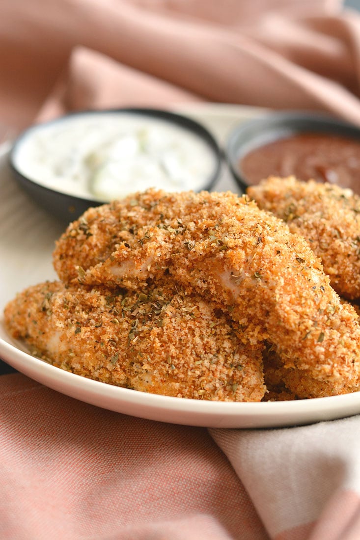 These Healthy Chicken Fingers have the same crunch of fried chicken for a fraction of the calories! Made with 4 ingredients, this Gluten Free meal is one you can feel good about eating! Gluten Free + Low Calorie