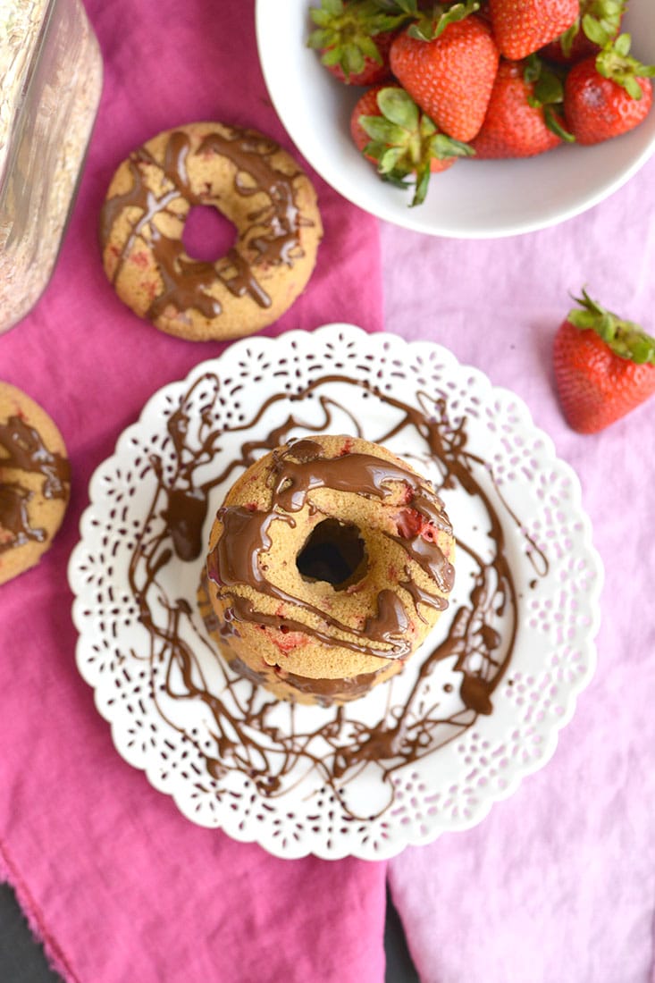 Skinny Strawberry Chocolate Donuts baked in the oven with lighter, healthier ingredients. Great for a sweet breakfast or snack, and super easy to make. Gluten Free + Low Calorie