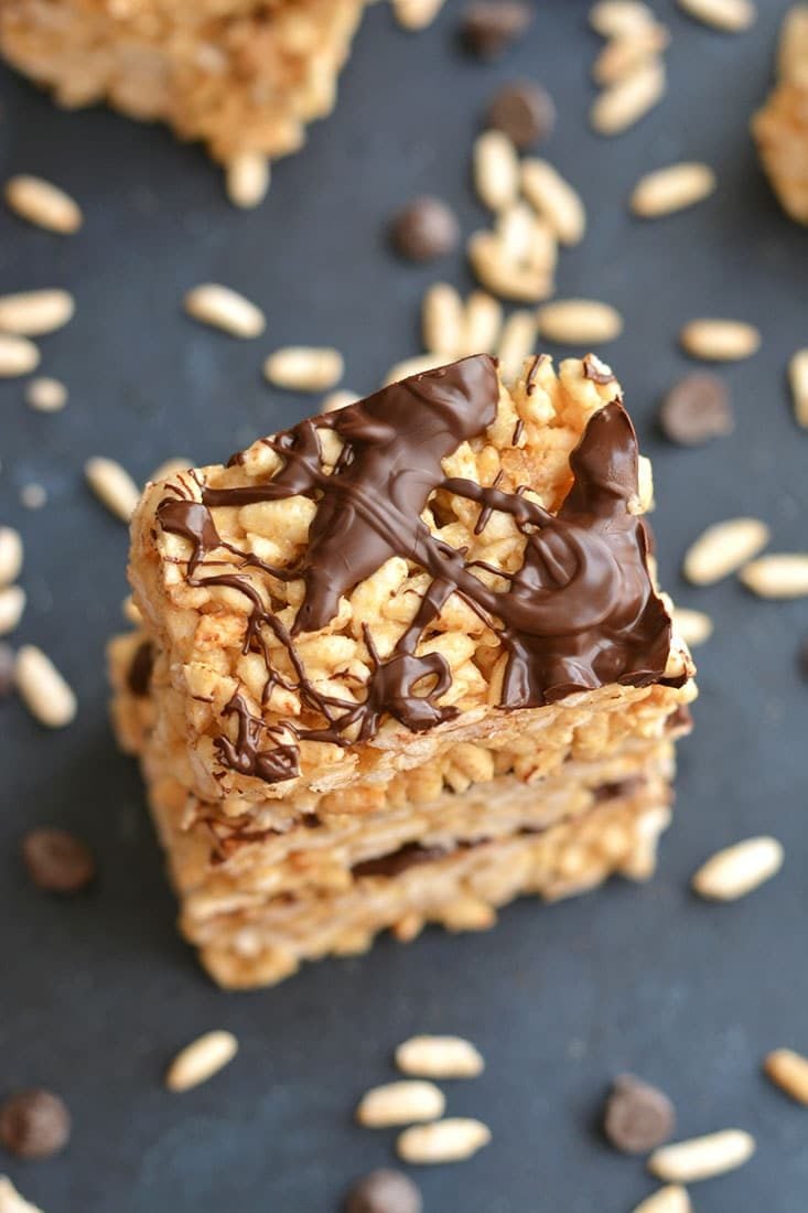 Healthy Rice Krispie Treats! Made with 3 ingredients, these no bake snacks are a healthy version of a classic favorite. Great as a post workout snack, a snack to take with you on the go, or an after dinner treat. Gluten Free + Low Calorie!