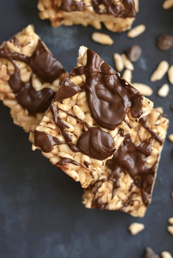 Healthy Rice Krispie Treats! Made with 3 ingredients, these no bake snacks are a healthy version of a classic favorite. Great as a post workout snack, a snack to take with you on the go, or an after dinner treat. Gluten Free + Low Calorie!