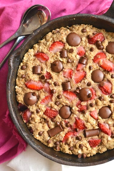 Gooey, Chocolatey Strawberry Chocolate Chip Skillet Cake! Low sugar & made with healthier, wholesome ingredients, you will fall in love with this indulgent weight watcher friendly dessert! Gluten Free + Low Calorie