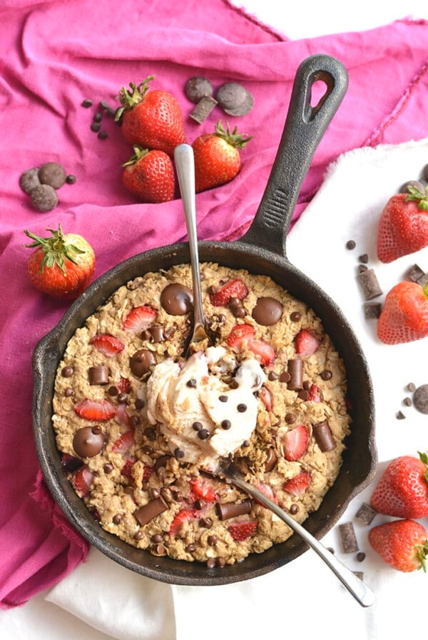 Gooey, Chocolatey Strawberry Chocolate Chip Skillet Cake! Low sugar & made with healthier, wholesome ingredients, you will fall in love with this indulgent weight watcher friendly dessert! Gluten Free + Low Calorie