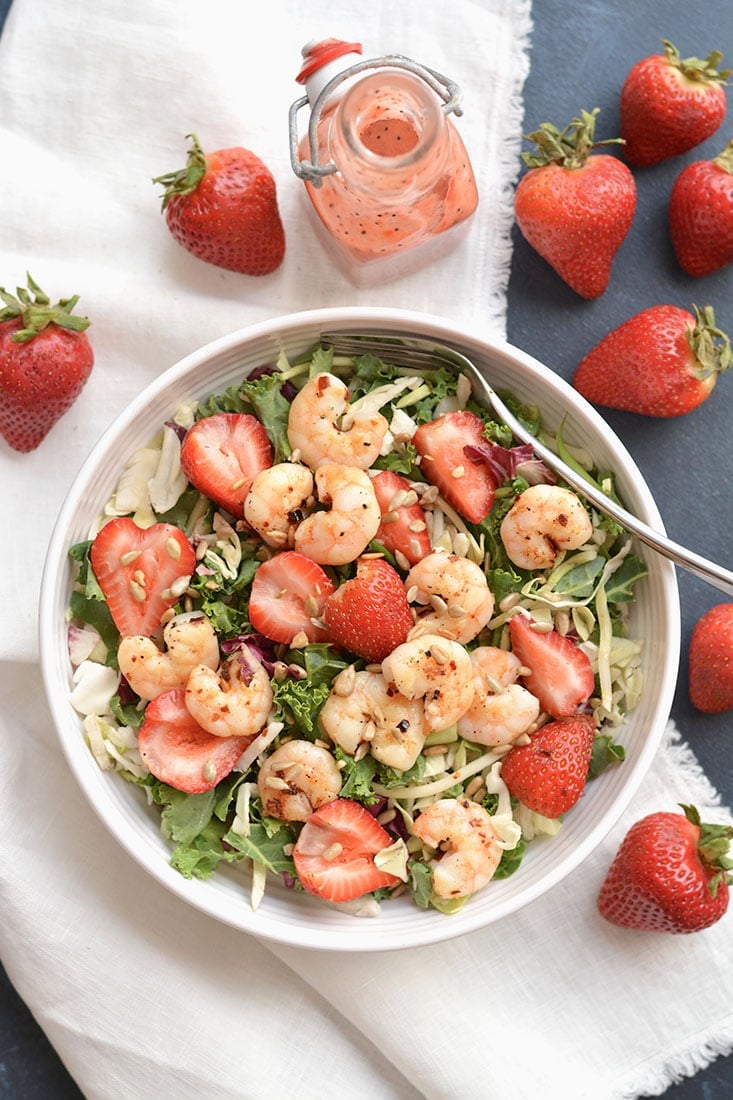 A satisfying Shrimp Strawberry Poppyseed Salad packed with delicious, simple ingredients & a light strawberry poppyseed vinaigrette. Easy to make fresh at home. Just toss and go! Great as a vegetarian main or side salad. Gluten Free + Low Calorie 