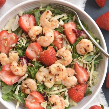 A satisfying Shrimp Strawberry Poppyseed Salad packed with delicious, simple ingredients & a light strawberry poppyseed vinaigrette. Easy to make fresh at home. Just toss and go! Great as a vegetarian main or side salad. Gluten Free + Low Calorie