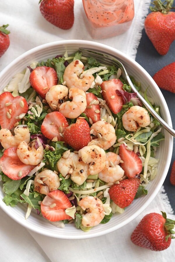 A satisfying Shrimp Strawberry Poppyseed Salad packed with delicious, simple ingredients & a light strawberry poppyseed vinaigrette. Easy to make fresh at home. Just toss and go! Great as a vegetarian main or side salad. Gluten Free + Low Calorie