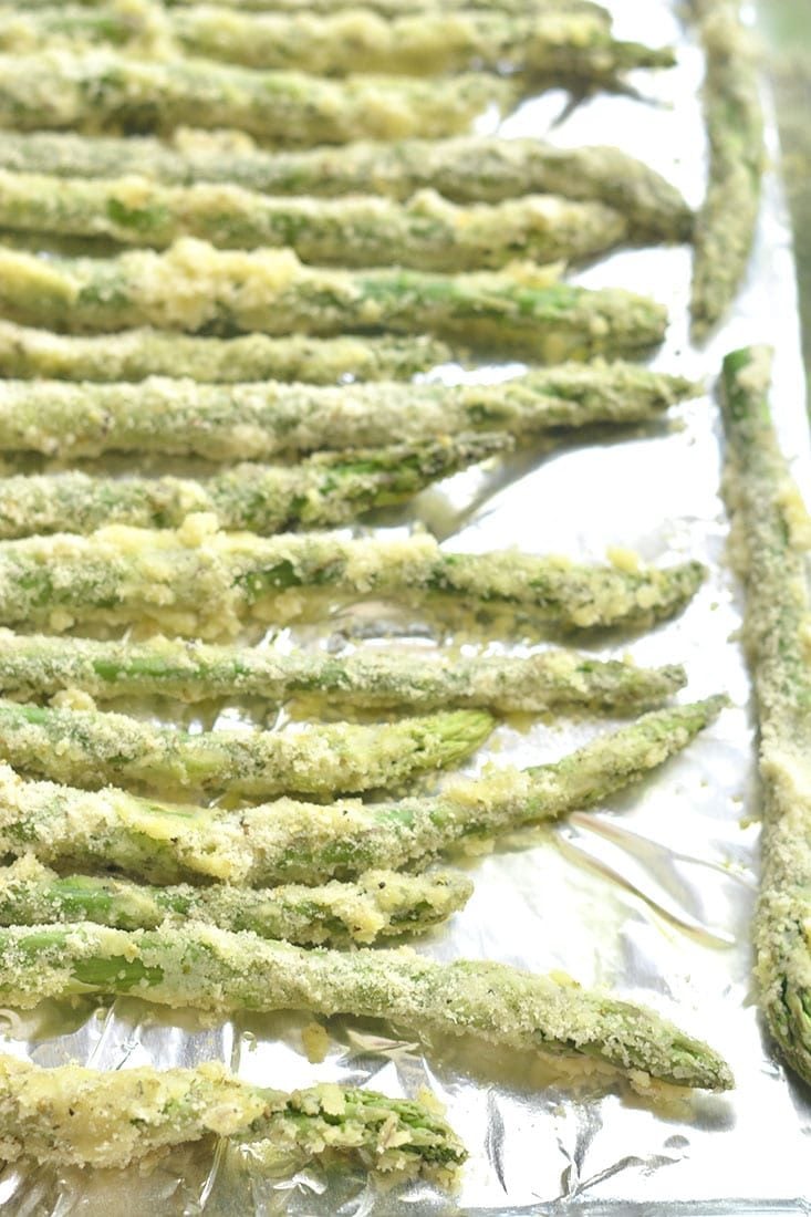 Eat more veggies! This Almond Crusted Asparagus with Soy Yogurt recipe is an easy way of flavoring boring veggies so you'll want to eat more of them. Paired with a simple Greek yogurt dipping sauce to dip your asparagus fries into for a simple & tasty side or appetizer. Gluten Free + Low Calorie