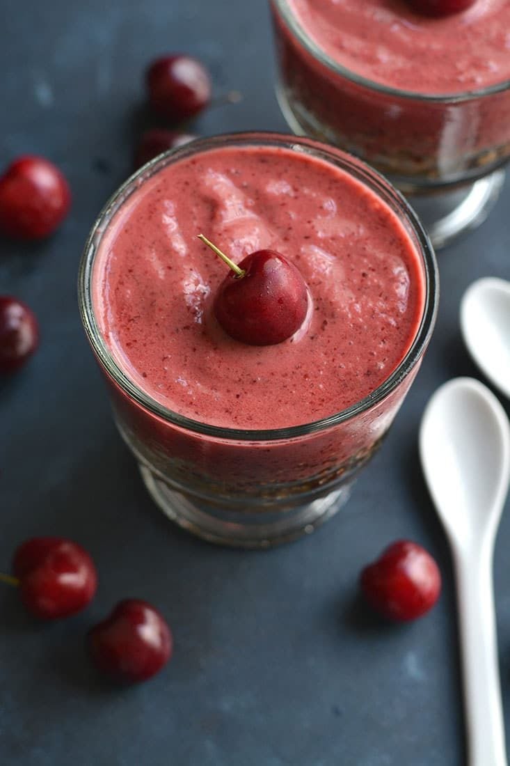 This Cherry Quinoa Smoothie is layered with quinoa & topped with a cherry smoothie. Mix the two together for a crunchy protein-packed breakfast!