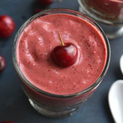 This Cherry Quinoa Smoothie is layered with quinoa & topped with a cherry smoothie. Mix the two together for a crunchy protein-packed breakfast!