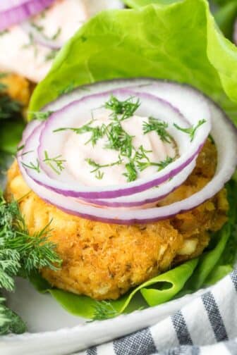 Healthy Fish Sandwich is made low calorie with almond flour baked in the oven. A healthy breaded fish sandwich recipe that's flavorful and gluten free. Paired with a tasty 2-ingredient hot sauce for a healthy meal.