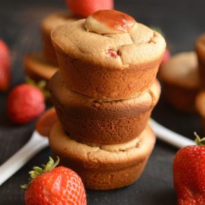 Healthy Peanut Butter & Jelly Muffins! These almond flour PB&J muffins are creamy, protein-packed & lightly sweetened with fresh strawberries. Take one with you for a healthy snack on the go! Gluten Free + Low Calorie