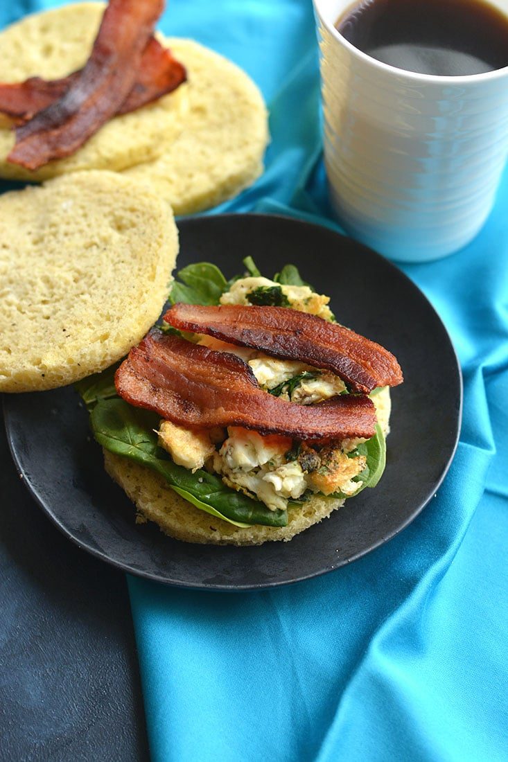 Low Carb Breakfast Sandwich made in under 2 minutes in the microwave. Make them ahead of time & freeze, or make them morning, noon or night for a healthy, Paleo, low carb fluffy like a cloud bread. Paleo + Gluten Free 