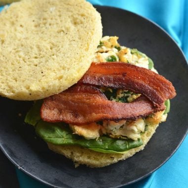 Low Carb Breakfast Sandwich made in under 2 minutes in the microwave. Make them ahead of time & freeze, or make them morning, noon or night for a healthy, Paleo, low carb fluffy like a cloud bread. Paleo + Gluten Free 