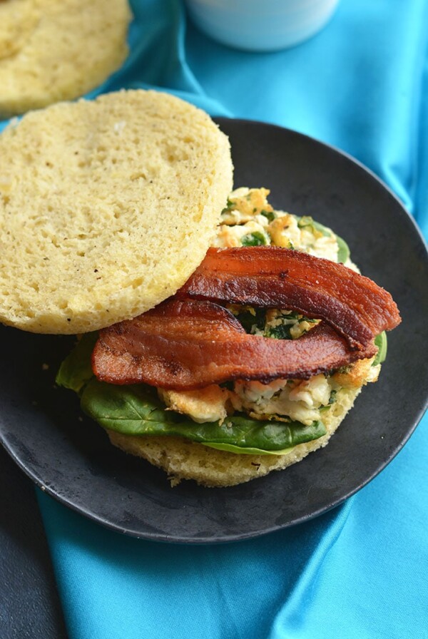 Low Carb Breakfast Sandwich made in under 2 minutes in the microwave. Make them ahead of time & freeze, or make them morning, noon or night for a healthy, Paleo, low carb fluffy like a cloud bread. Paleo + Gluten Free 