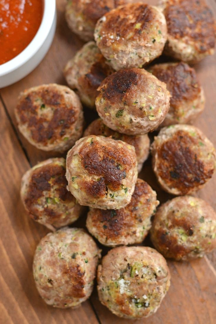 Healthy Zucchini Parmesan Meatballs! Baked in less than 30 midnutes & freezable. These meatballs are perfect for meal prepping, a quick weeknight dinner or serving as an appetizer. Gluten Free + Low Calorie
