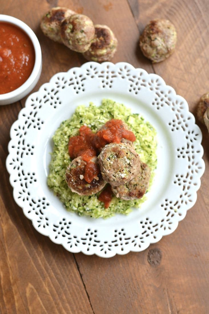 Healthy Zucchini Parmesan Meatballs! Baked in less than 30 midnutes & freezable. These meatballs are perfect for meal prepping, a quick weeknight dinner or serving as an appetizer. Gluten Free + Low Calorie