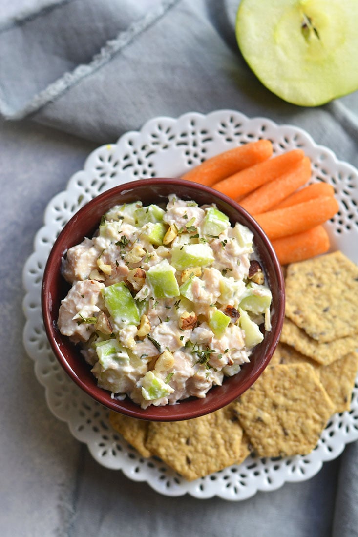 This Meal Prep Apple Hazelnut Chicken Salad is the perfect light, low carb lunch! Made mayo free, Paleo friendly and flavorful! Serve over lettuce, in a sandwich or wrap. An easy meal prep lunch you can take with you on the go! Gluten Free + Low Calorie + Paleo