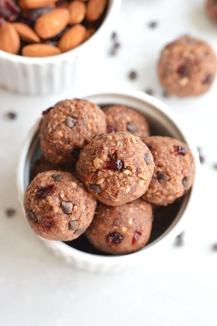 These Vegan Chocolate Almond Cranberry Bliss Bites are a must make for healthy snacking! Super simple to make with only 7 ingredients. No baking required! Gluten Free + Paleo + Vegan + Low Calorie