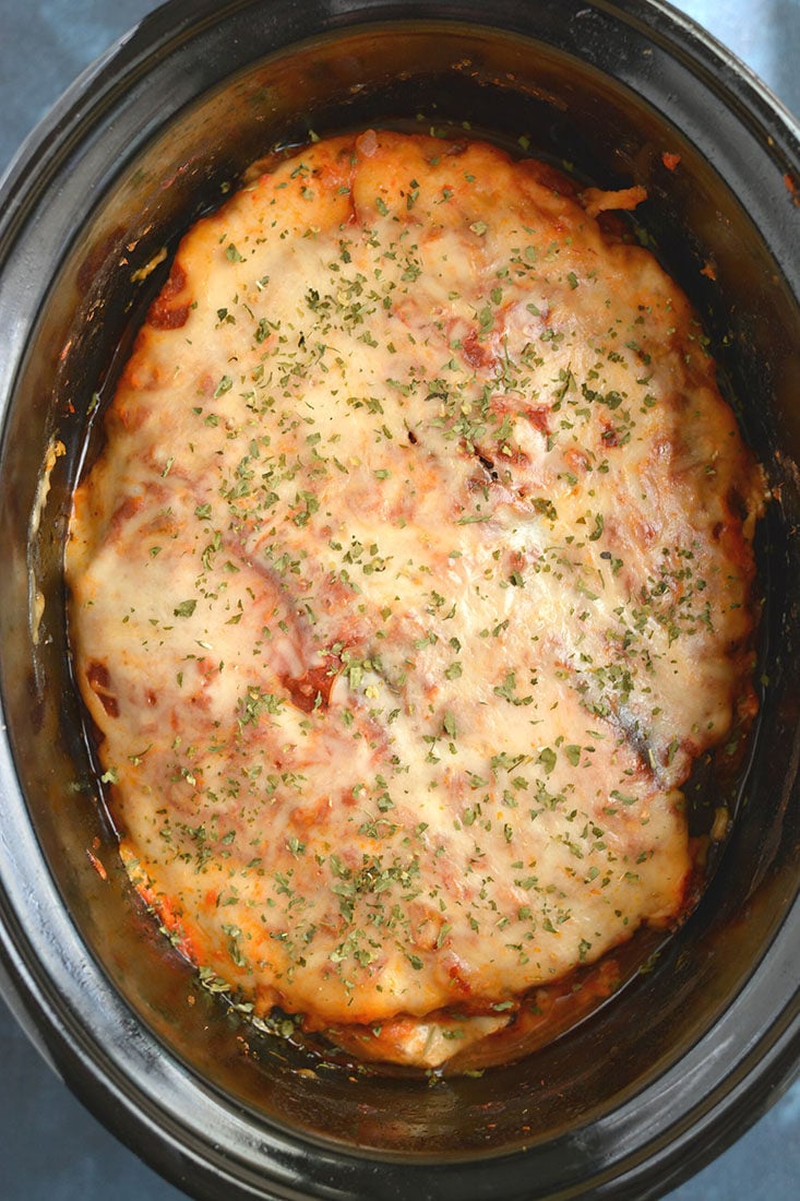 Low Carb Crockpot Lasagna! This no-noodle lasagna made with ground chicken, eggplant & cottage cheese is a healthier lasagna that's cheesy, tasty & light! Gluten Free + Low Calorie + Low Carb