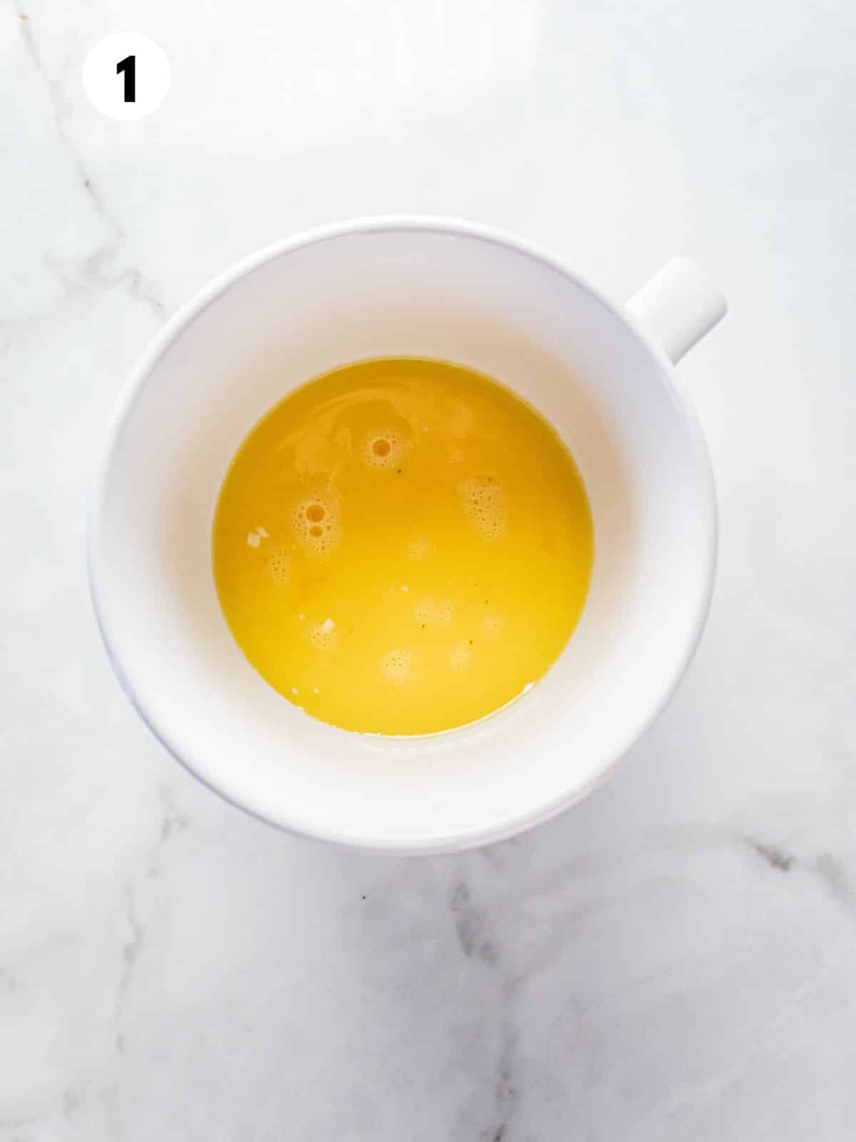 Eggs scrambled in a mug. 
