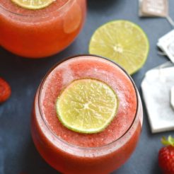 Boost your health with an antioxidant & Vitamin C rich Strawberry Green Tea! This fruit sweetened tea is cool, refreshing, and nourishing. Perfect for a hot day. Vegan + Paleo + Gluten Free + Low Calorie