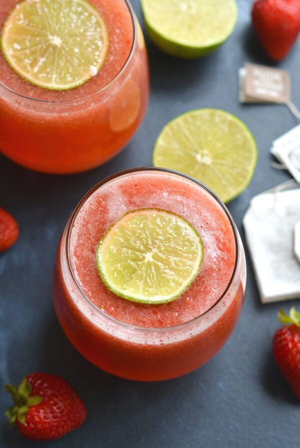 Boost your health with an antioxidant & Vitamin C rich Strawberry Green Tea! This fruit sweetened tea is cool, refreshing, and nourishing. Perfect for a hot day. Vegan + Paleo + Gluten Free + Low Calorie
