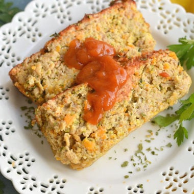 Savory Paleo Carrot Zucchini Meatloaf! A classic recipe gets a healthy makeover as a leaner, low carb, protein-packed meal. Bonus, all veggies included! Great for meal prepping for lunch or dinner! Gluten Free + Low Calorie + Paleo