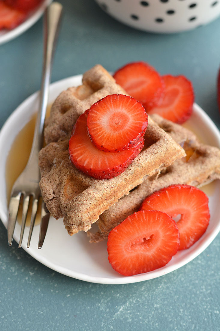 Super Easy 5 Ingredient Coconut Flour Waffles! Made with real food ingredients, these low carb waffles are the perfect fuel for a busy morning or weekend breakfast. Freezer friendly for meal prep too! Paleo + Low Calorie + Gluten Free
