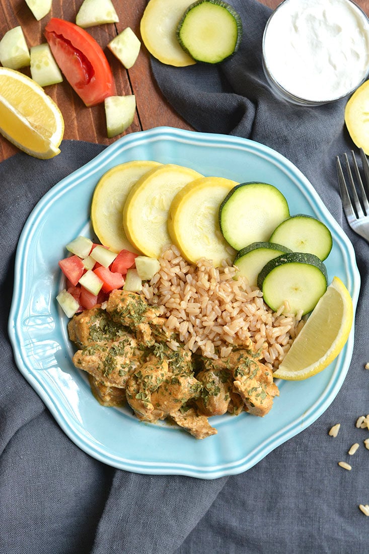 This Crockpot Chicken Shawarma is a hearty meal packed with Mediterranean flavors. A quick slow cooker recipe, just dump and go. High protein and feeds plenty. Gluten Free + Low Calorie