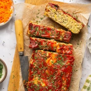 Savory Paleo Carrot Zucchini Meatloaf! A classic recipe gets a healthy makeover as a leaner, low carb, protein-packed meal. Bonus, all veggies included! Great for meal prepping for lunch or dinner! Gluten Free + Low Calorie + Paleo