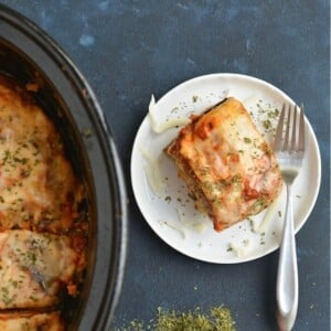 A slice of low carb crockpot lasagna on a plate.