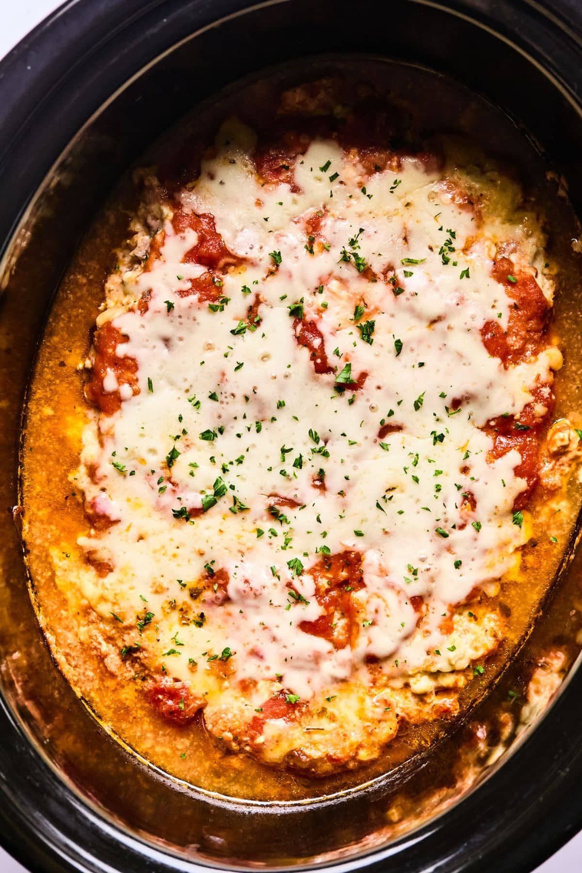 Cooked low carb lasagna in a crockpot.