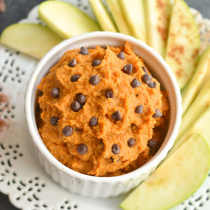 Pumpkin Protein Cookie Dough! A nutritious dip for dipping fruit in or eating by the spoonful. EASY to make and tastes like REAL cookie dough.