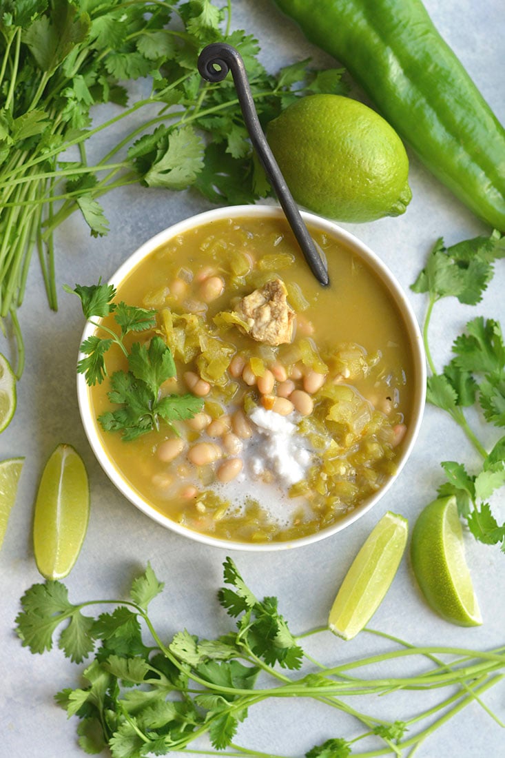 Healthy White Chicken Chili! A flavorful, hearty chili make with a few simple ingredients. A fiber and protein rich meal that will feed many.  Easy to make in 20 minutes of less! Gluten free + Low Calorie