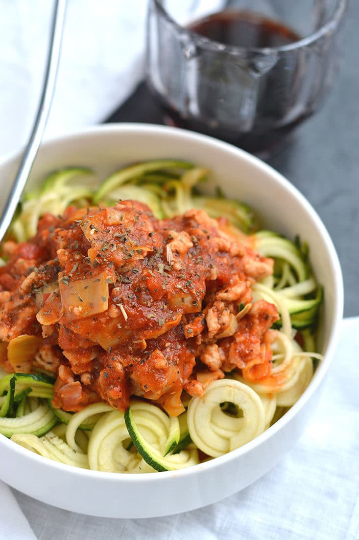 Meal Prep Bolognese with Zucchini Noodles! Healthy bolognese made with zucchini noodles & artichokes in 15 minutes. A classic recipe made over with simple ingredient swaps. EASY for meal prepping a healthy lunch or dinner. Gluten Free + Low Calorie + Paleo