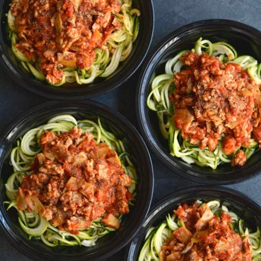 Meal Prep Bolognese with Zucchini Noodles! Healthy bolognese made with zucchini noodles & artichokes in 15 minutes. A classic recipe made over with simple ingredient swaps. EASY for meal prepping a healthy lunch or dinner. Gluten Free + Low Calorie + Paleo