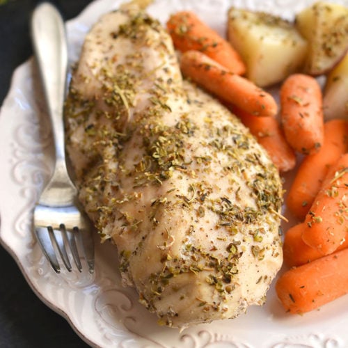 Chicken, Carrots & Potatoes made in a slow cooker! This Crockpot Italian Chicken & Potatoes makes the most tender chicken. An EASY, 5-ingredient dinner packed with flavor that will satisfy the whole family! Gluten Free + Paleo + Low Calorie