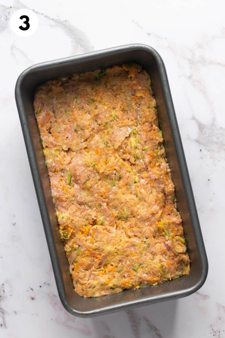 Turkey meatloaf mixture placed in a loaf pan.