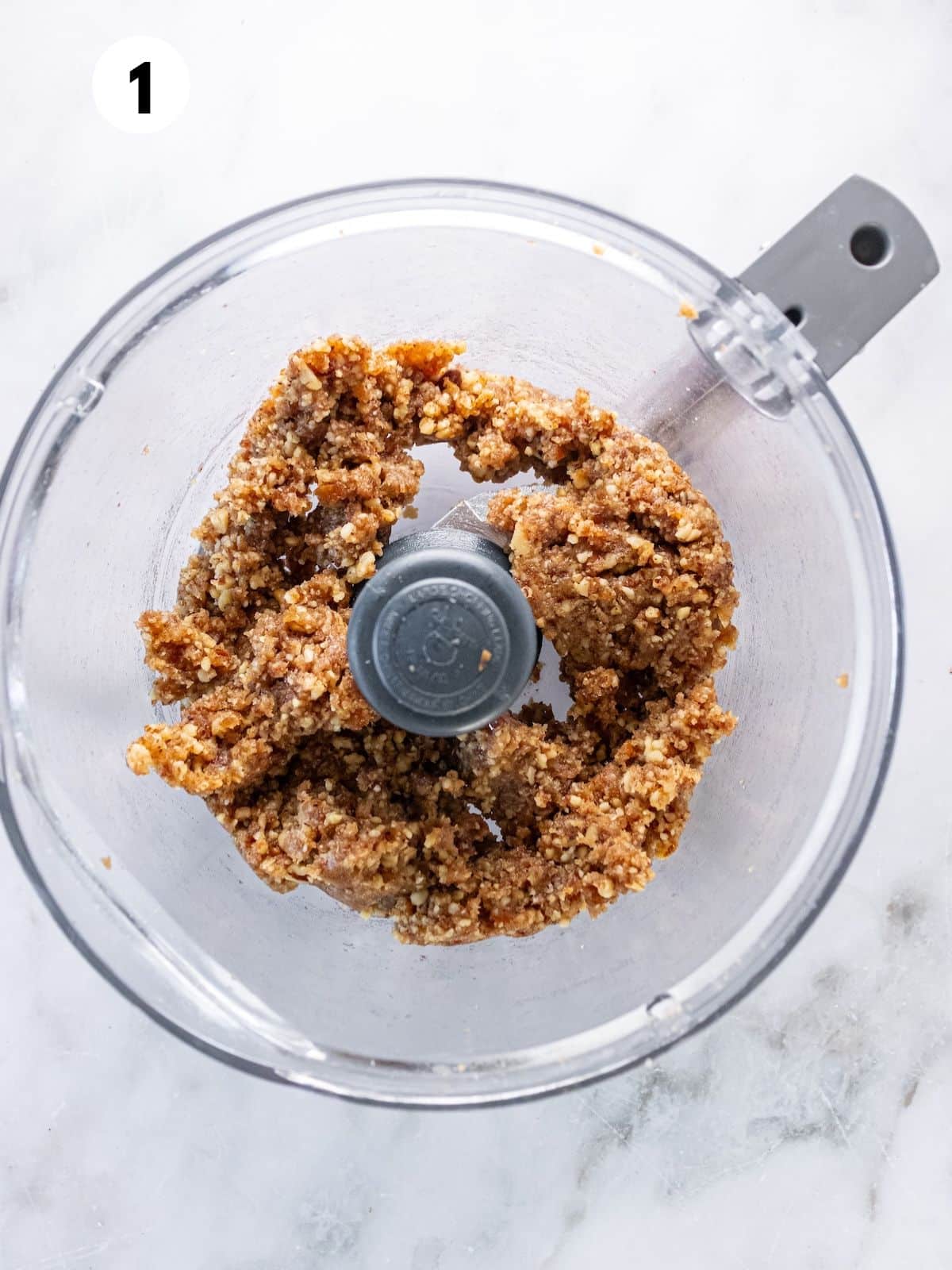 Ingredients for making a pumpkin pie crust in a food processor.