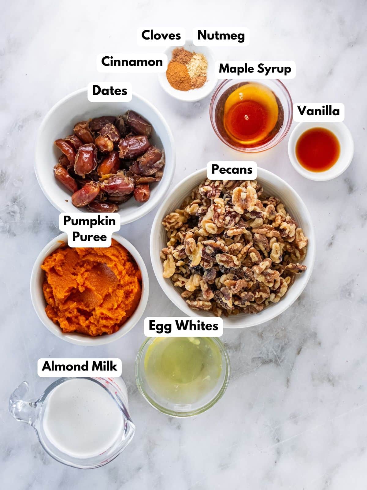 Ingredients for making this pumpking pie in bowls.