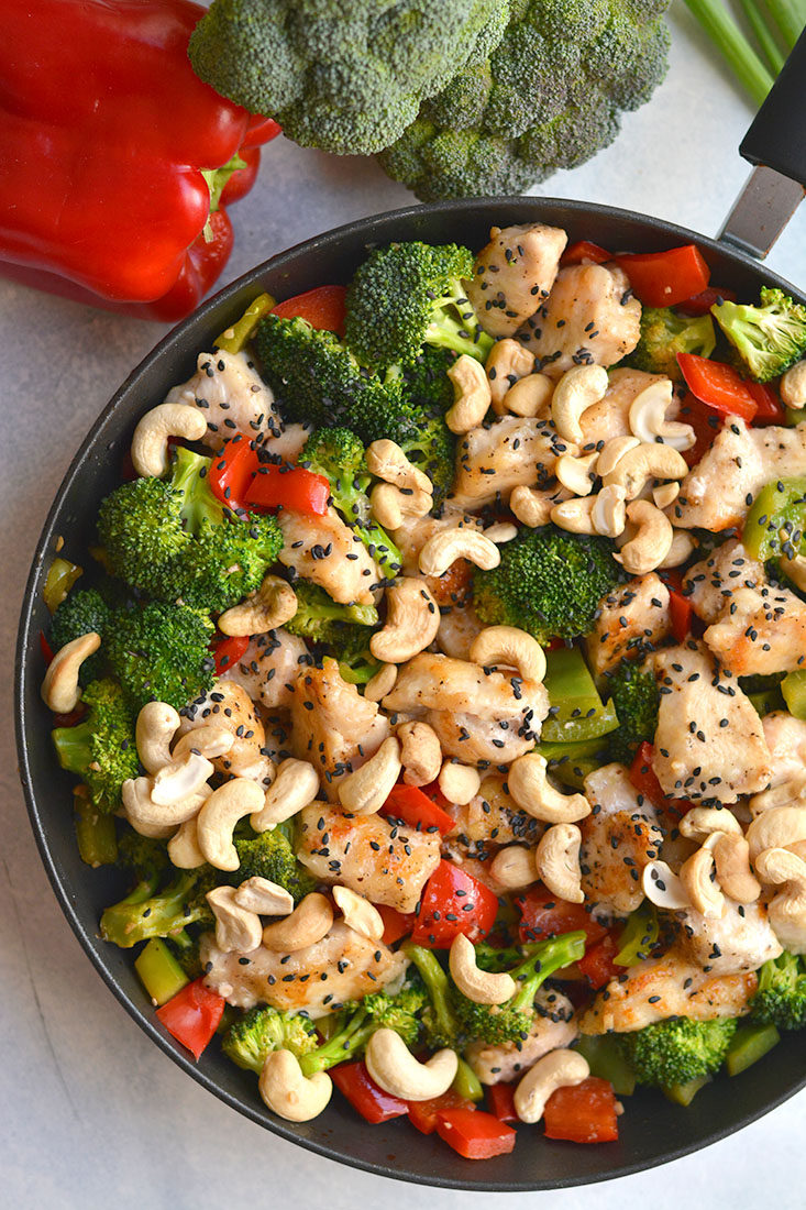 Meal Prep Cashew Chicken! An EASY, 20 minute one skillet meal that's loaded with veggies, crispy chicken & flavor. Cheaper & healthier than take-out! Gluten Free + Low Calorie with Paleo substitutions