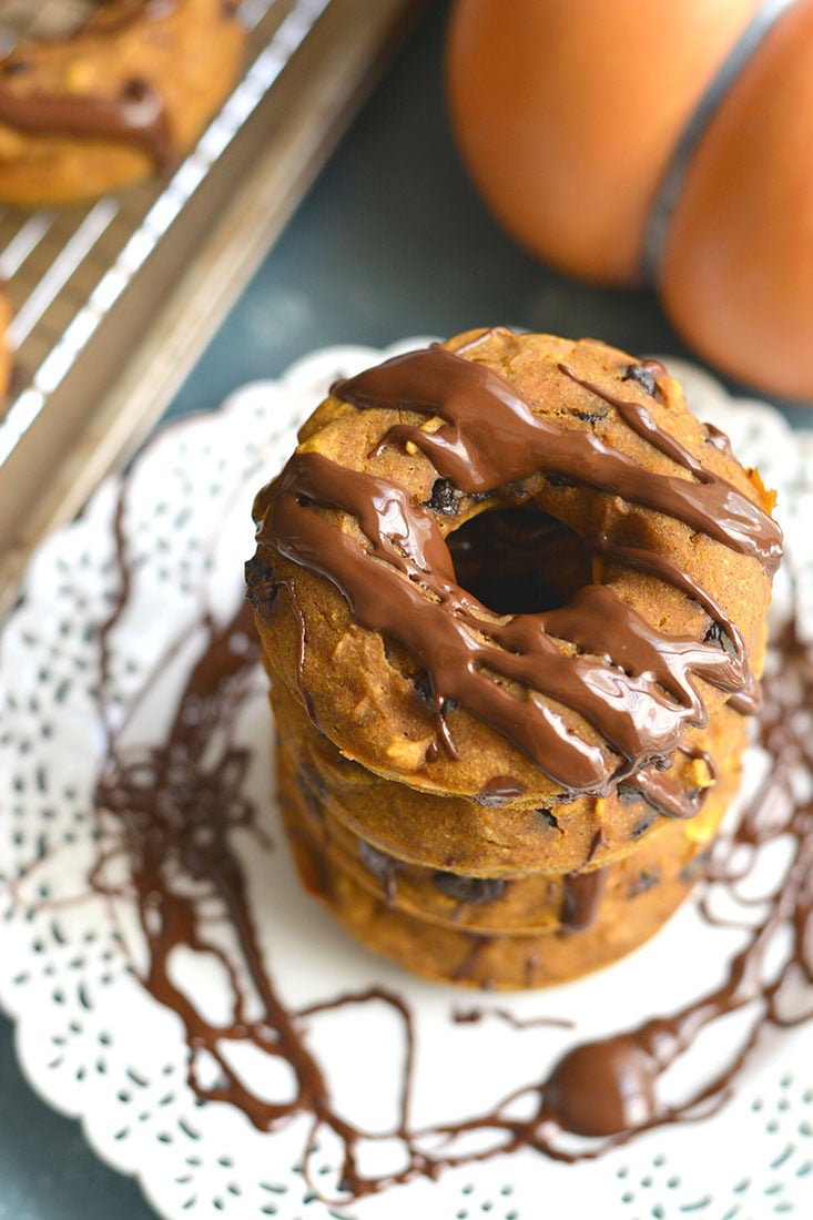 Healthy Pumpkin Oat Chocolate Donuts! Made gluten free with no oil, these bakery style baked donuts are easy to make, great for kids, a sweet breakfast or to snack on! Gluten Free + Low Calorie